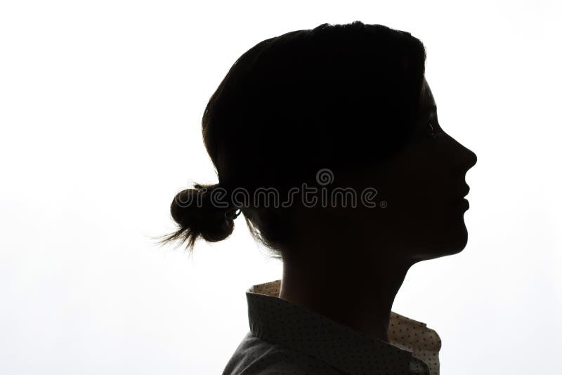 Dark silhouette of a young girl on white background, the concept of anonymity. Dark silhouette of a young girl on a white background, the concept of anonymity royalty free stock images Dark silhouette of a young girl on white background, the concept of anonymity. Dark silhouette of a young girl on a white background, the concept of anonymity royalty free stock images