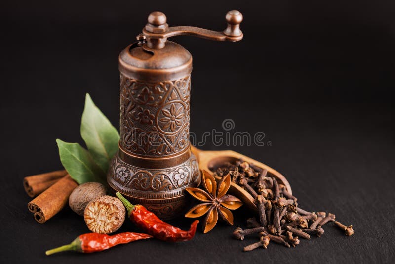 Dark still-life with different spices and retro