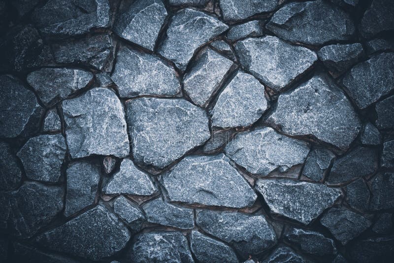 Dark stone wall background. Abstract gray grunge texture. Black granite surface, floor. Natural pattern for art design. Rock textu royalty free stock images