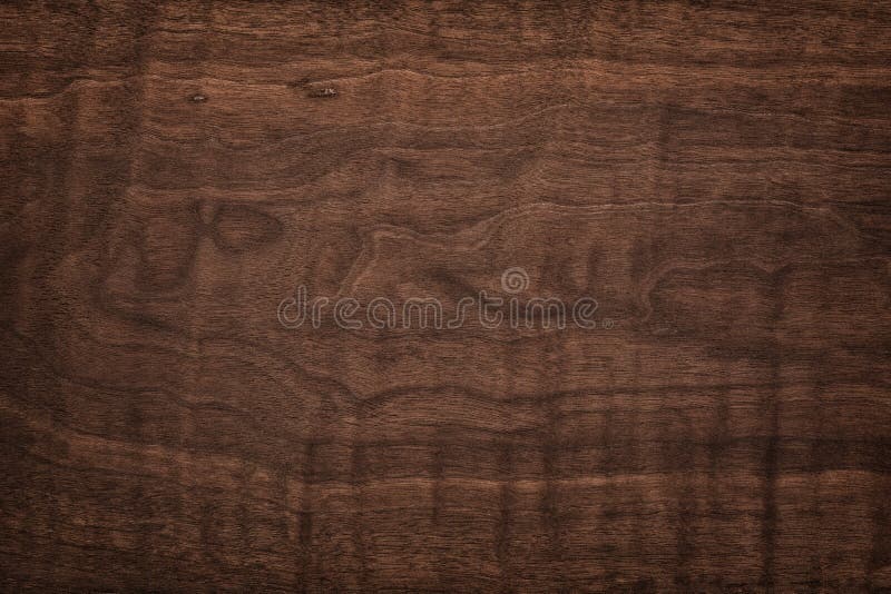 Dark board background, wood texture. arboreal table or wall surface. Dark board background, wood texture. arboreal table or wall surface