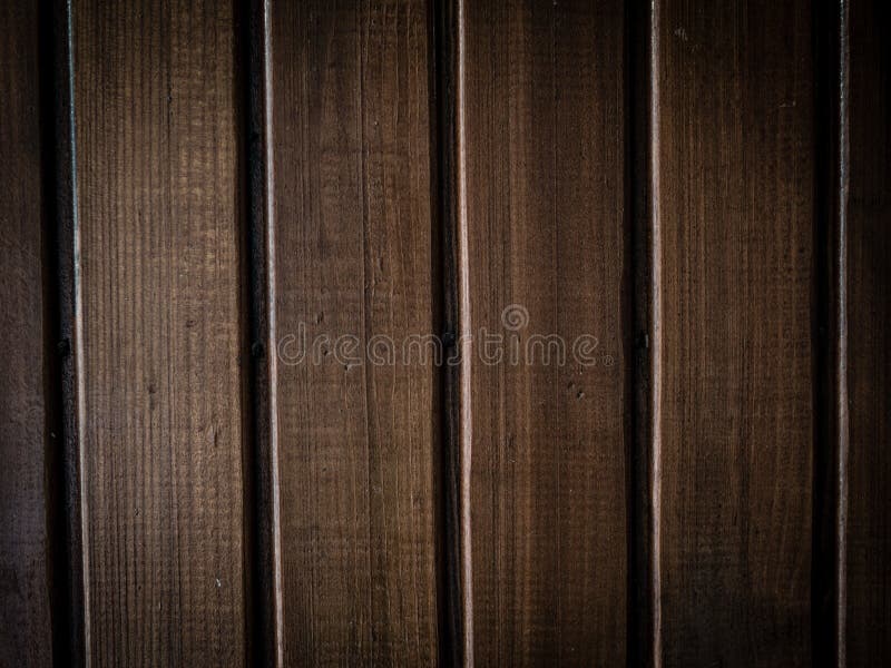 Dark Wooden Wall Texture Made of Vertical Wooden Planks Stock Photo