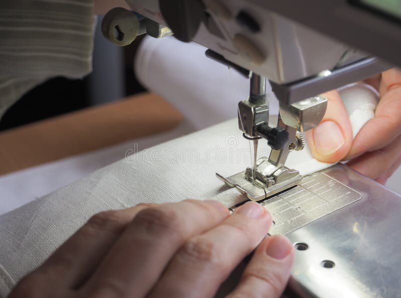 Darning Jeans on a Sewing Machine. Stock Image Image of hand, presser