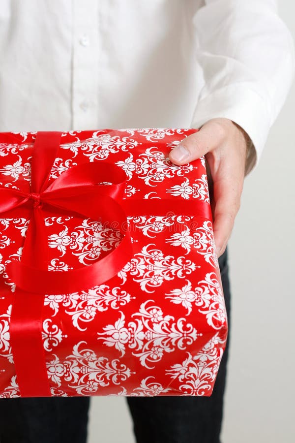 Darstellen eines Geschenks lizenzfreie stockbilder Darstellen eines Geschenks lizenzfreie stockbilder