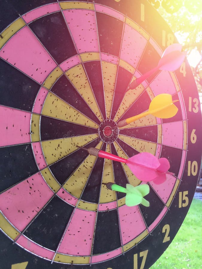 Dartboard is the Target and Dart is an Opportunity Blur . Stock Image