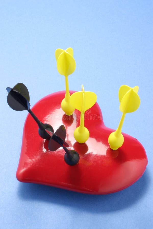 Darts on Loave Heart stock photo. Image of accuracy, valentine 21046528