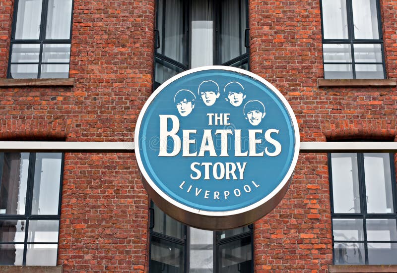 The Beatles Story Exhibition Sign, at Albert Dock, Liverpool, UK. A popular tourist attraction. The Beatles Story Exhibition Sign, at Albert Dock, Liverpool, UK. A popular tourist attraction.