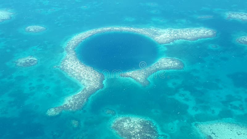 An aerial picture of the great blue hole in belize. An aerial picture of the great blue hole in belize