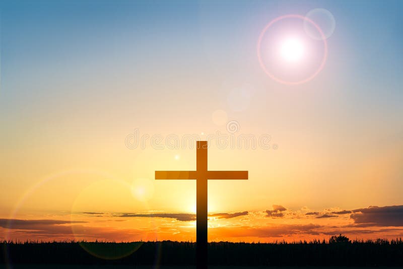 Das Kreuz Gottes in den Strahlen der Sonne.