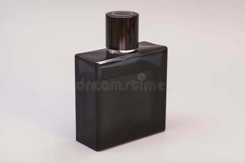 Das Parfüm der Männer in der Flasche lizenzfreie stockfotografie Das Parfüm der Männer in der Flasche lizenzfreie stockfotografie