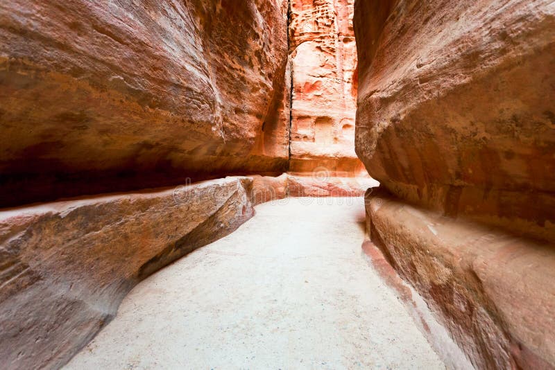 The Siq - narrow gorge to ancient city Petra, Jordan. The Siq - narrow gorge to ancient city Petra, Jordan