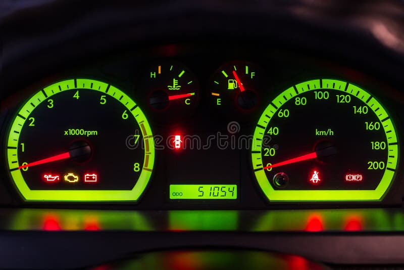 The Dashboard of the Car with Green Lights. Stock Photo Image of