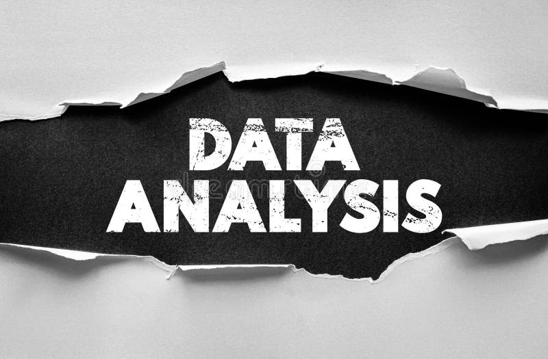 Data Analysis wording in distressed bold letters under torn paper. Business and research concept representing analytics, insight royalty free stock photo