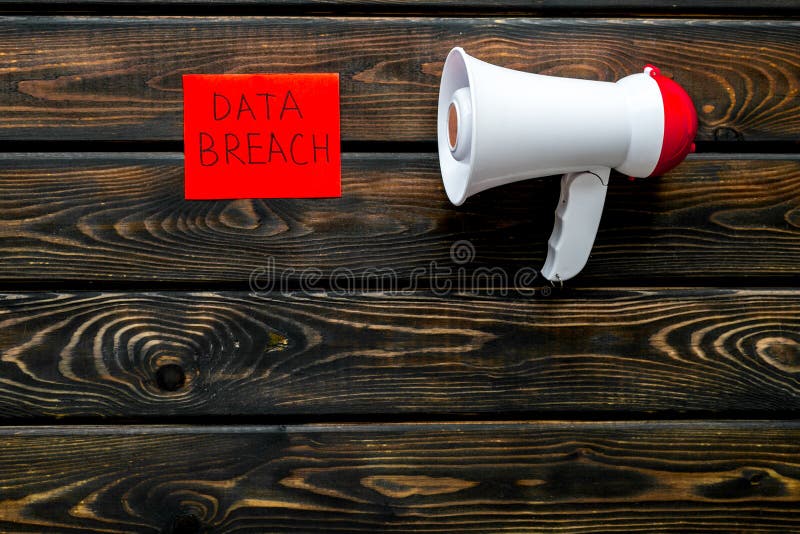 Download Data Breach Concept With Megaphone On Wooden Background ...