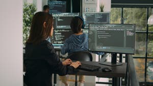 Database Developer Using Computer To Write Code On Terminal Window Database Developer Using Computer To Write Code On Terminal Window