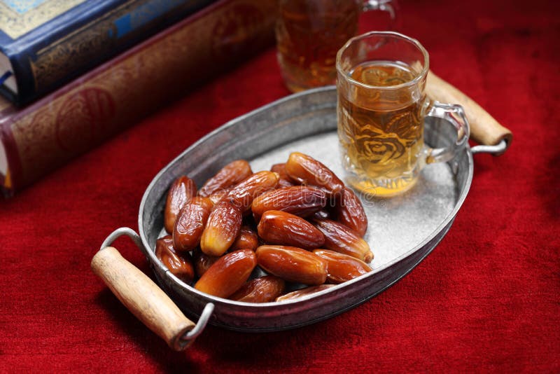 Dates Fruit and Islamic Book on Carpet Background, Islamic Background