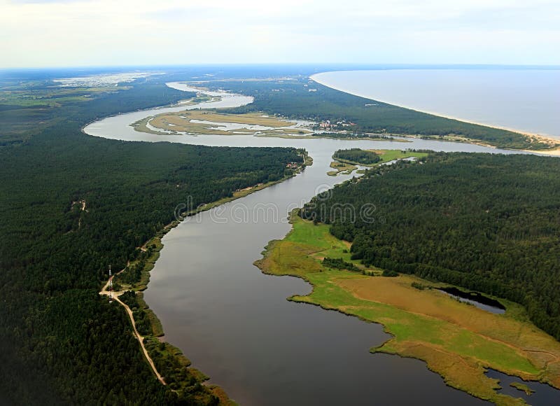 The Daugava river flows into the Gulf of Riga, Baltic sea, near Riga, Latvia royalty free stock photo The Daugava river flows into the Gulf of Riga, Baltic sea, near Riga, Latvia royalty free stock photo