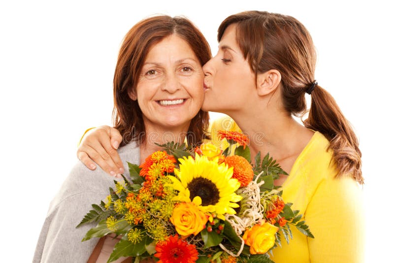 Daughter kissing her mother