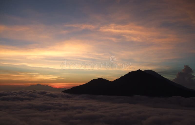 Dawn - sun rising showing a warm yellow glow and bluish tint skies