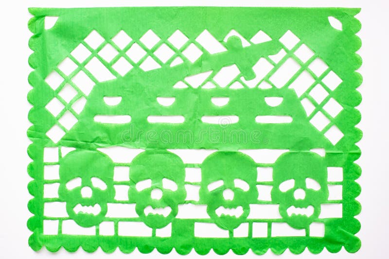 Day of the Dead, Papel Picado. Green Real traditional Mexican paper cutting flag. Isolated on white background. Day of the Dead, Papel Picado. Green Real traditional Mexican paper cutting flag. Isolated on white background.