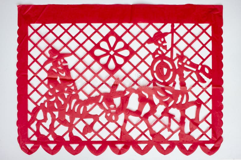 Day of the Dead, Papel Picado. Red Real traditional Mexican paper cutting flag. Isolated on white background. Day of the Dead, Papel Picado. Red Real traditional Mexican paper cutting flag. Isolated on white background.
