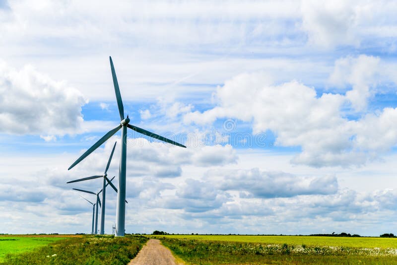 Day view wind power turbines generate electricity