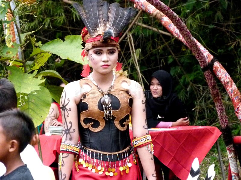 Dayak Girl Dressed Typical of the Bahau Dayak Tribe, East Kalimantan ...