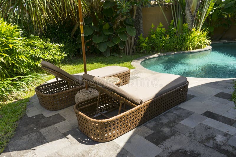 Daybed beside the pool stock photo. Image of bath, architecture 97882278