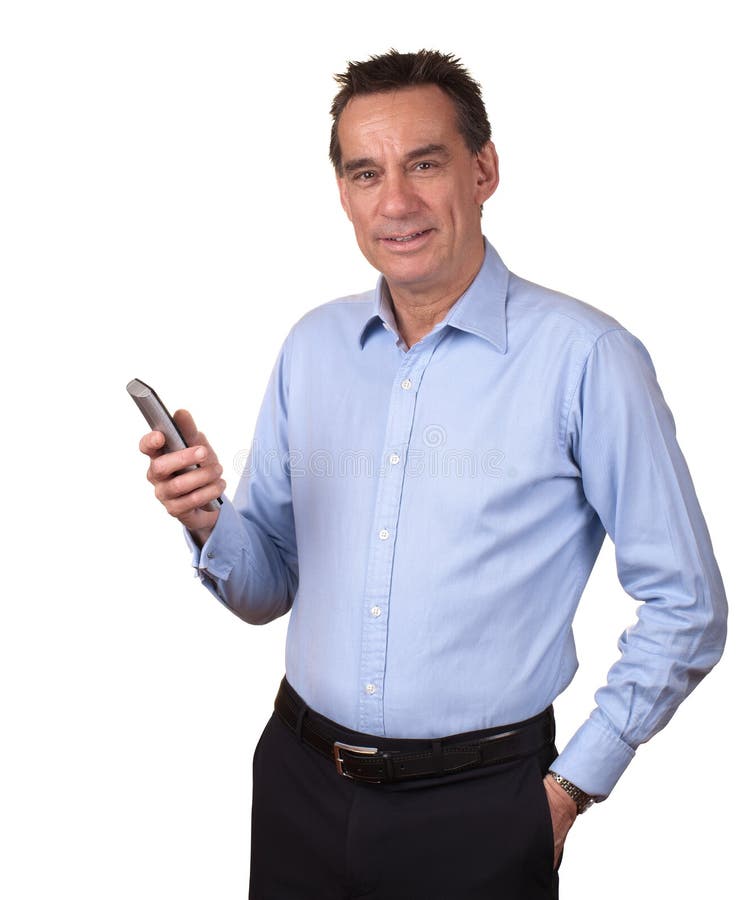De aantrekkelijke het Glimlachen Telefoon van de Holding van de Mens stock afbeeldingen De aantrekkelijke het Glimlachen Telefoon van de Holding van de Mens stock afbeeldingen