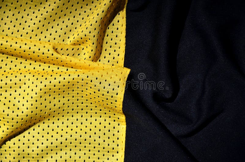 De achtergrond van de de stoffentextuur van de sportkleding Hoogste mening van de gele textieloppervlakte van de polyester nylon royalty-vrije stock afbeelding De achtergrond van de de stoffentextuur van de sportkleding Hoogste mening van de gele textieloppervlakte van de polyester nylon royalty-vrije stock afbeelding