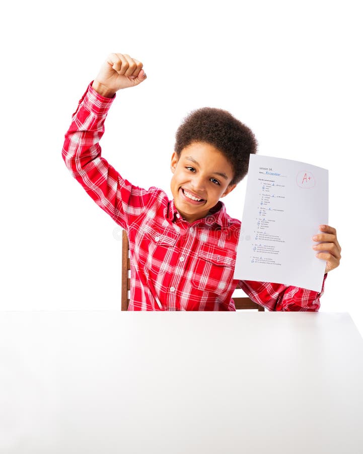 Success or winner, African American school boy, teenager celebrating A grade test with hand up. Isolated, on white background, with copy space. Success or winner, African American school boy, teenager celebrating A grade test with hand up. Isolated, on white background, with copy space