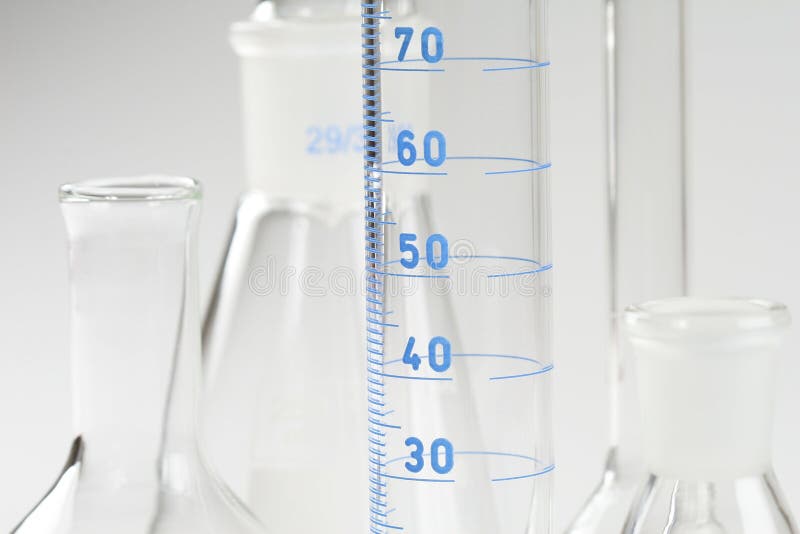 Detail of chemical glassware on a white background. Detail of chemical glassware on a white background