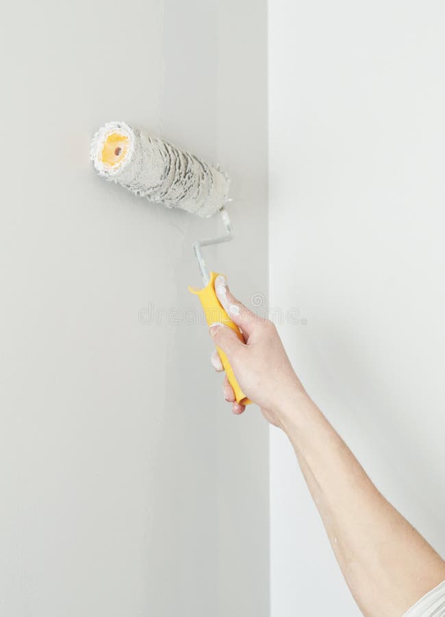 Schilder aan het werk met roller royalty-vrije stock foto