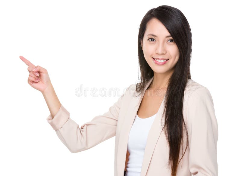De Aziatische onderneemster met vingerpunt bevordert tot iets stock foto's De Aziatische onderneemster met vingerpunt bevordert tot iets stock foto's