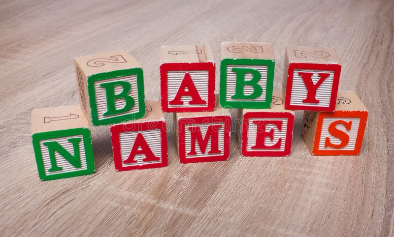 Toy blocks spelling out `BABY NAMES`. Toy blocks spelling out `BABY NAMES`