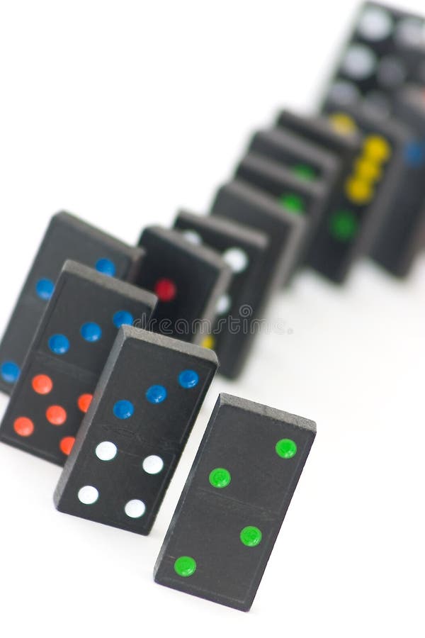 Some wooden domino bricks, blurred background. Some wooden domino bricks, blurred background