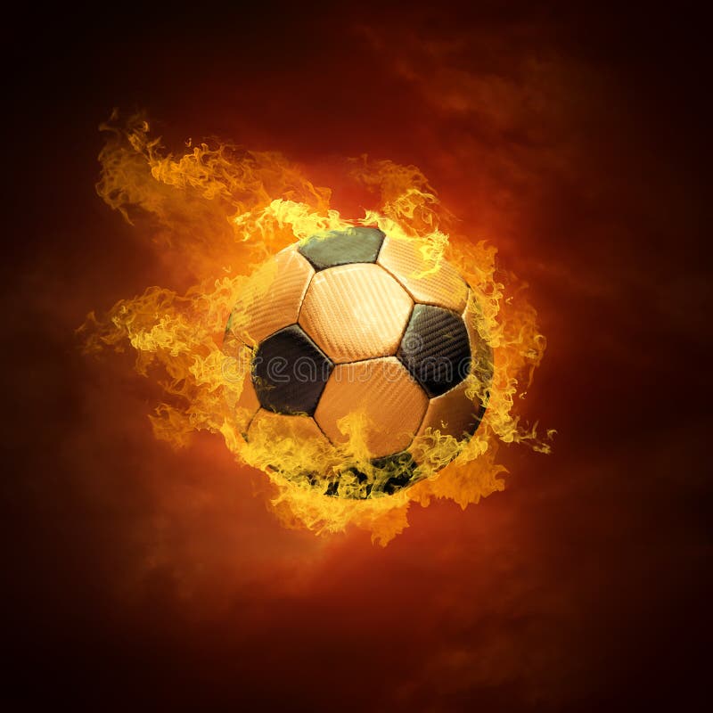 De bal en de brand van het voetbal royalty-vrije stock foto's De bal en de brand van het voetbal royalty-vrije stock foto's