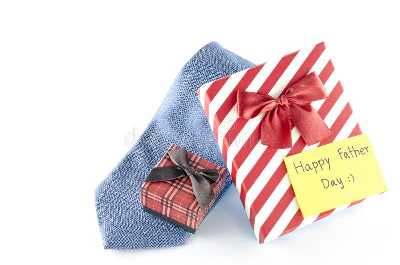 De band en twee giftdozen met kaartmarkering schrijven het gelukkige woord van de vaderdag stock foto's De band en twee giftdozen met kaartmarkering schrijven het gelukkige woord van de vaderdag stock foto's