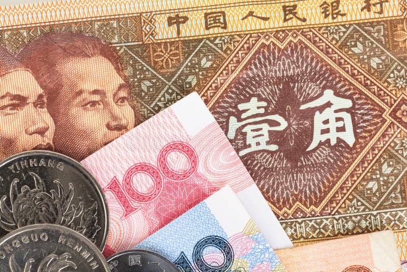 Chinese or Yuan banknotes money and coins from Chinas currency, close up view as background. Chinese or Yuan banknotes money and coins from Chinas currency, close up view as background