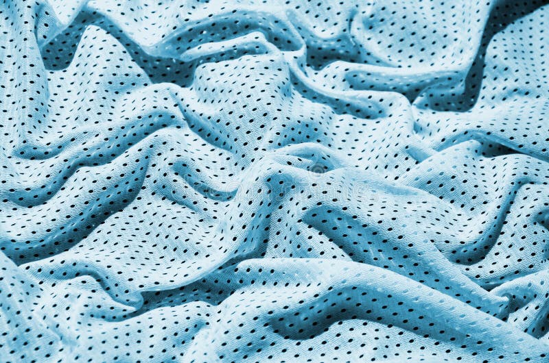 De blauwe achtergrond van de de stoffentextuur van de sportkleding Hoogste mening van lichtblauwe doek textieloppervlakte Helder stock foto De blauwe achtergrond van de de stoffentextuur van de sportkleding Hoogste mening van lichtblauwe doek textieloppervlakte Helder stock foto