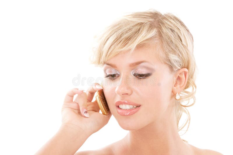 Blond young woman communicates by phone, isolated on white background. Blond young woman communicates by phone, isolated on white background.