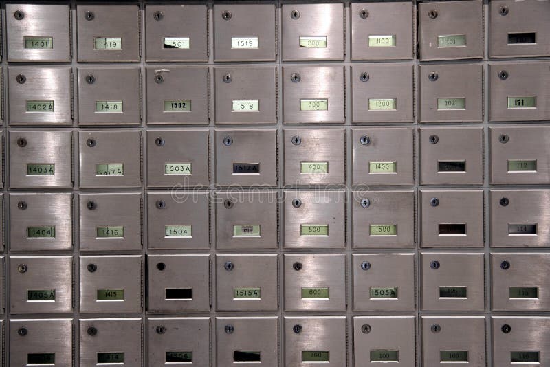 Typical mailboxes for tenants found in an apartment building lobby. Typical mailboxes for tenants found in an apartment building lobby