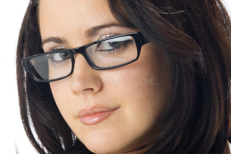 A nice portrait of young and really cute brunette with black glasses. A nice portrait of young and really cute brunette with black glasses