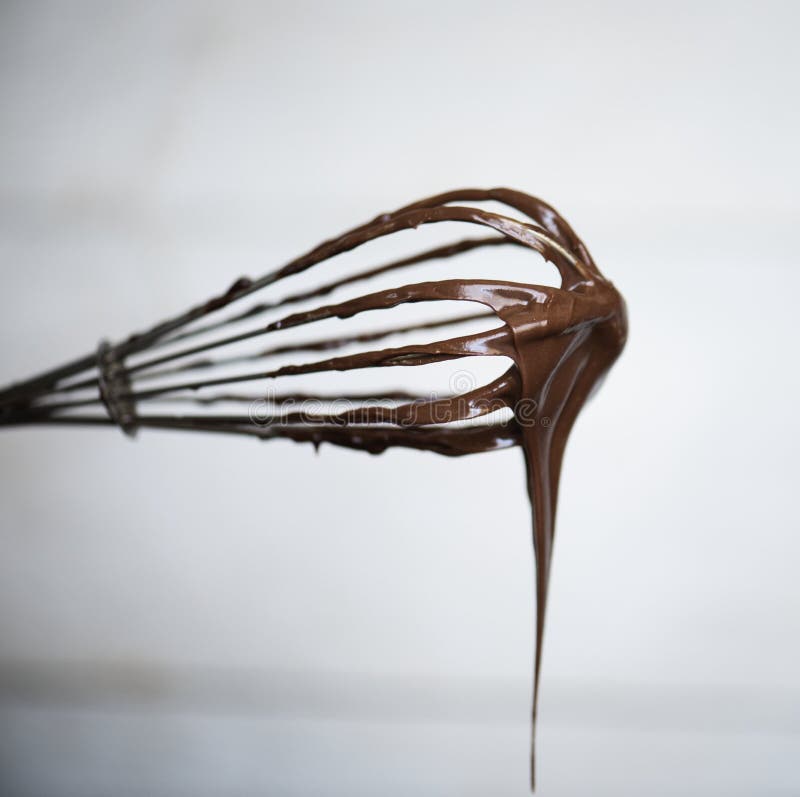 De chocoladesaus op zwaait stock afbeelding De chocoladesaus op zwaait stock afbeelding