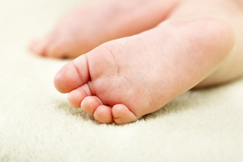 A newborn baby closeup feet. A newborn baby closeup feet