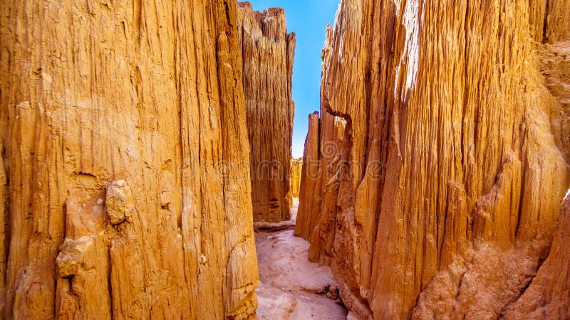 The dramatic and unique patterns of Slot Canyons caused by erosion of the soft volcanic Bentonite Clay in Cathedral Gorge State Park in the Nevada Desert, United Sates. The dramatic and unique patterns of Slot Canyons caused by erosion of the soft volcanic Bentonite Clay in Cathedral Gorge State Park in the Nevada Desert, United Sates