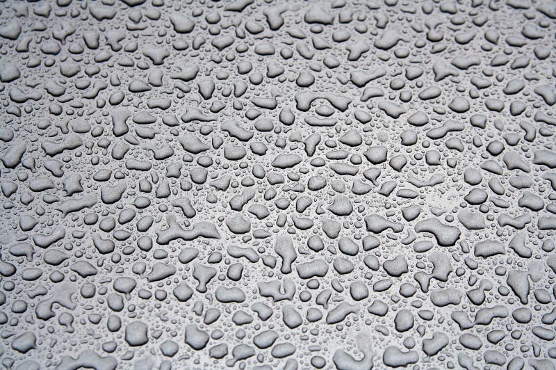 Water Droplets on a Steel Surface. Close-up. Water Droplets on a Steel Surface. Close-up