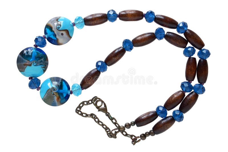 De eigengemaakte vrouwelijke parels worden gemaakt van eenvoudige kubussen en ballen van g royalty-vrije stock foto's De eigengemaakte vrouwelijke parels worden gemaakt van eenvoudige kubussen en ballen van g royalty-vrije stock foto's