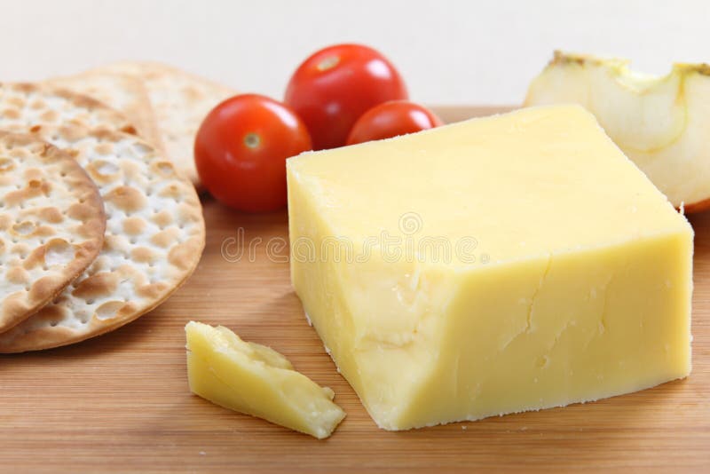 Waar Is Cheddar Kaas Van Gemaakt De Engelse Kaas Van De Cheddar Stock Afbeelding - Image of snijden