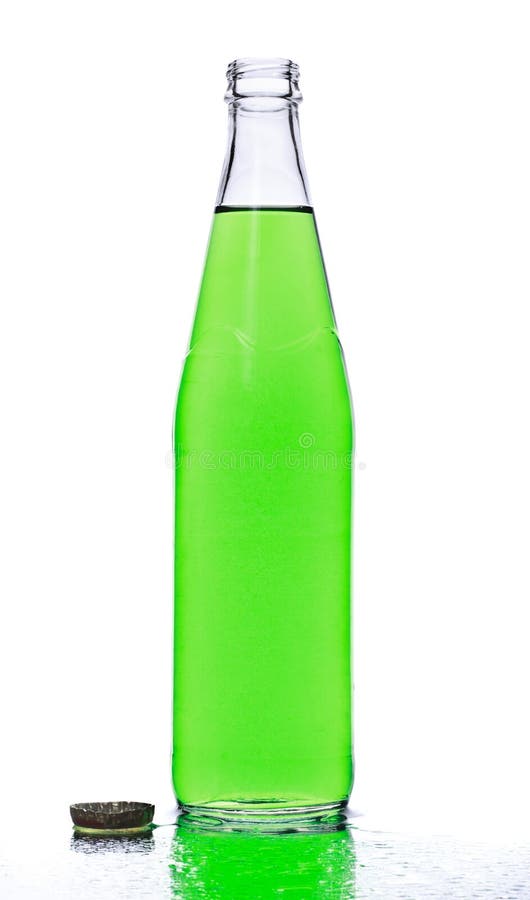 Green soda bottle and ice cubes, white background. Green soda bottle and ice cubes, white background