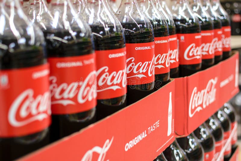 Coca-Cola-flessen stock afbeeldingen